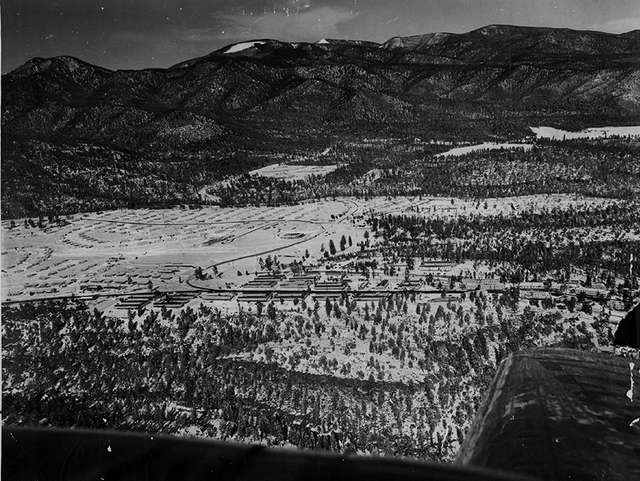 This first aerial photograph of Los Alamos, N.M., in 1949 shows old and new housing developments at the city, secretly created by the U.S. government to accommodate 6,000 scientists and other people involved in the Manhattan Project. The project forced native New Mexican families around Los Alamos from their land and subjected generations to cancer and other health problems, which the new film Oppenheimer failed to address. (Photo By The Denver Post via Getty Images)
