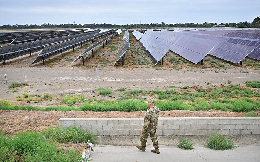 New arms control initiatives will be needed so that funds now directed at nuclear weapons can be invested in projects dealing with the threat of climate change. In August, Joint Forces Training Base in Los Alamitos, Calif. inaugurated a project intended to increase energy resilience for the base and Southern California by adding locally generated carbon-free renewable electricity to the grid.  (Photo by Frederic J. Brown/AFP via Getty Images)