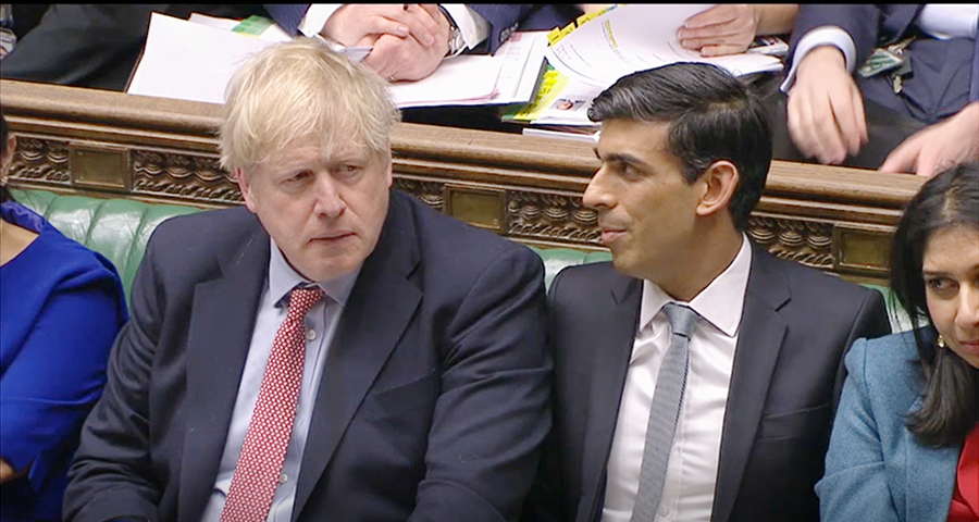The administration of UK Prime Minister Boris Johnson of the Conservative Party (L), seen here in 2020, stunned the world in 2021 by raising the limit on the country’s nuclear stockpile. The government of his Conservative Party successor, Rishi Sunak (R),  shows no interest in changing course. (Photo by House of Commons/PA Images via Getty Images)