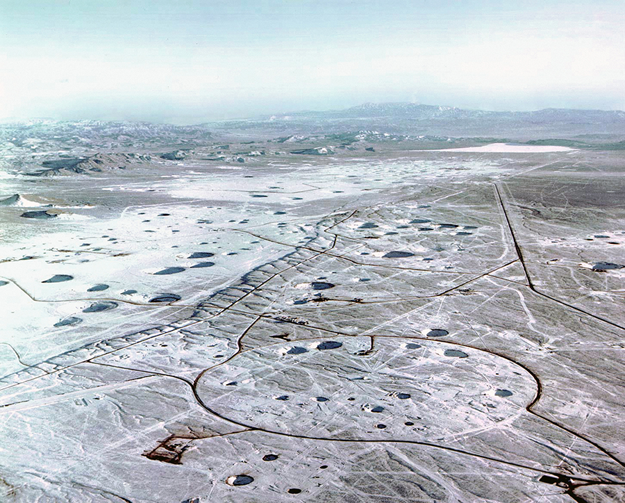 The crater-scarred landscape of the Nevada Test Site at the north end of Yucca Flat as it looked in 1995. From 1951 until 1958, the United States conducted 119 atmospheric tests in this valley and from 1962 until 1992, it conducted more than 1,000 underground tests. The United States has observed a moratorium on nuclear testing since 1992. (Photo by Galerie Bilderwelt/Getty Images)
