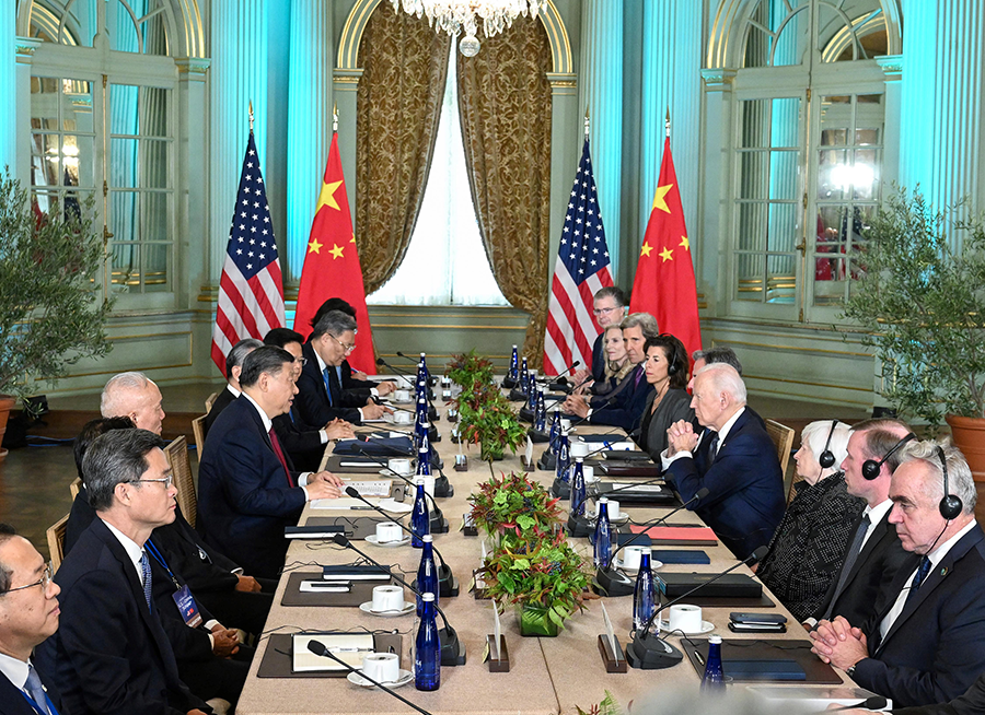Along with their delegations, Chinese President Xi Jinping (L, Center) and U.S. President Joe Biden (R, Center) discuss issues of security, economics and curbing fentanyl production during a summit at Filoli Estate, near San Francisco, on November 15.  (Photo by Rao Aimin/Xinhua via Getty Images) 