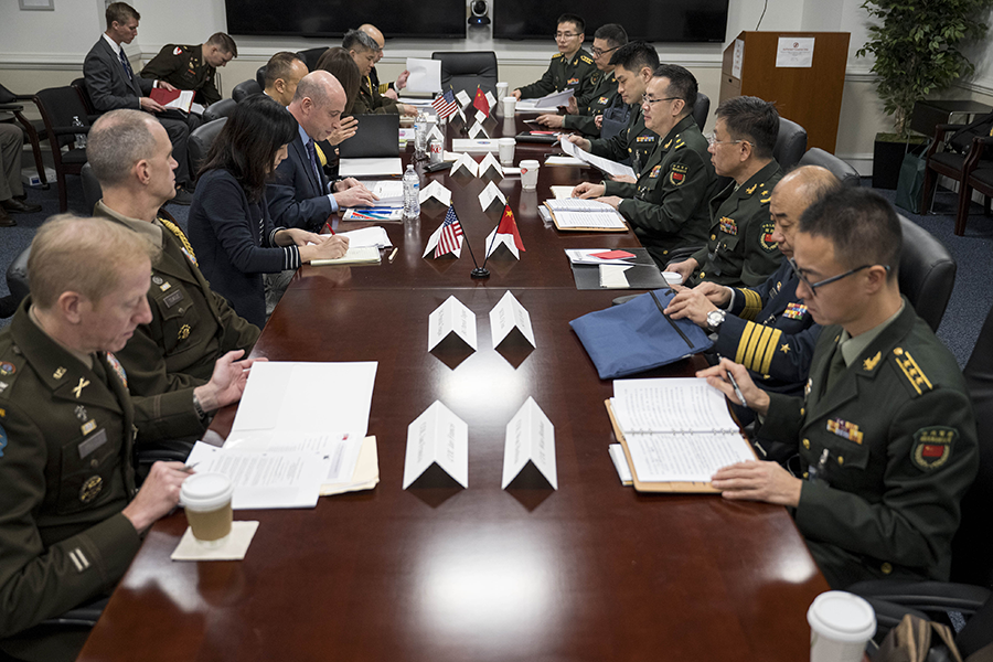 Michael S. Chase (C, L), U.S. deputy assistant secretary of defense for China, Taiwan and Mongolia, hosts Chinese delegation led by Maj. Gen. Song Yanchao (C, R), deputy director of the Chinese Central Military Commission Office for International Military Cooperation for meetings at the Pentagon on Jan. 9. (U.S. Department of Defense photo by Navy Petty Officer 1st Class Alexander Kubitza)