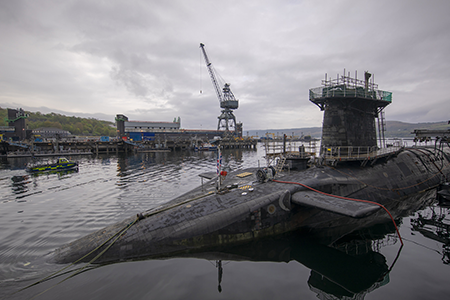 The UK HMS Vigilant, which carries Trident nuclear missiles, is a key example of nuclear cooperation between the United Kingdom and the United States. (Photo by James Glossop/ WPA Pool/Getty Images)