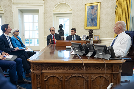 U.S. President Joe Biden, seen at an Oval Office briefing on artificial intelligence (AI) in July, recently issued an AI policy memorandum and reaffirmed that humans always should be “in the loop” for decisions on nuclear weapons use. (Official White House photo by Adam Schultz)