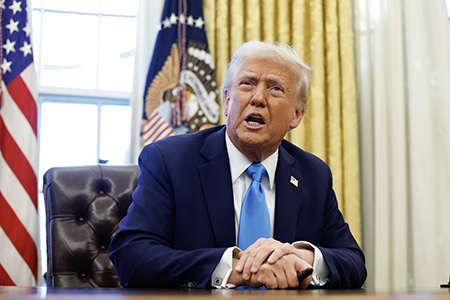 U.S. President Trump speaks with reporters at the White House Feb. 4 after signing a national security memorandum “reimposing maximum pressure” on Iran. (Photo by Anna Moneymaker/Getty Images)