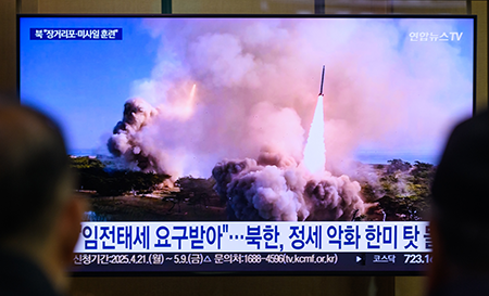 South Korean television footage May 8 of a North Korean joint striking drill involving long-range artillery and missile systems conducted at an undisclosed location in North Korea. (Photo by Kim Jae-Hwan/SOPA Images/LightRocket via Getty Images)