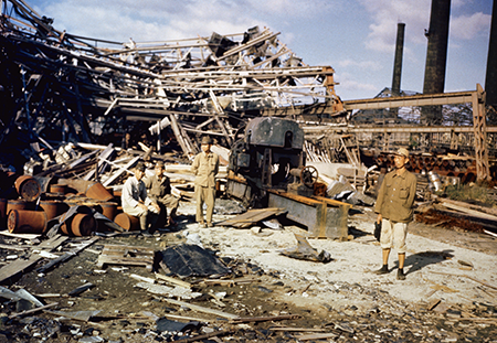 Japanese soldiers in Nagasaki on October 5, 1945, amid the devastation caused by the atomic bombing of the city on August 9. The plutonium implosion-type bomb named Fat Man was dropped by a Boeing B-29 Superfortress and destroyed most of the downtown area. (Photo By Galerie Bilderwelt/Getty Images)