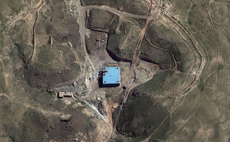 This satellite image from 2013 shows the site of a suspected nuclear reactor at Al-Kubur, Syria, which Israel destroyed six years earlier. Syria’s new government has given International Atomic Energy Agency experts permission to inspect the country’s suspected nuclear sites. (Photo by DigitalGlobe via Getty Images)