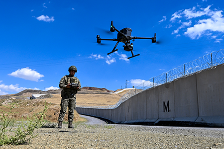A Turkish guard uses a drone to help patrol the country’s border. The United States is seeking to surpass China and Turkey as the premier manufacturer of drones and other unmanned vehicles. (Photo by Ozkan Bilgin/Anadolu via Getty Images)