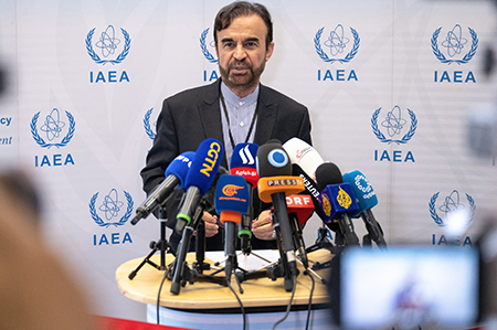Reza Najafi, Iran’s ambassador to the International Atomic Energy Agency (IAEA), speaks to journalists after a meeting of the agency’s Board of Governors in Vienna June 23. (Photo by Joe Klamar/AFP via Getty Images)