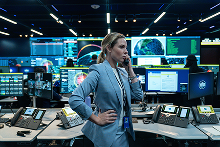 Actor Rebecca Ferguson as Captain Olivia Walker in the White House Situation Room passes information about what is known about the nuclear crisis “up the chain” and to the commander-in-chief. (Photo by Netflix)