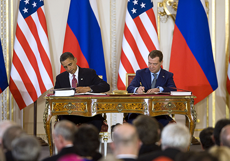 U.S. President Barack Obama (L) and Russian President Dmitry Medvedev sign the New Strategic Arms Reduction Treaty (New START) April 8, 2010 in Prague. The most significant arms control treaty between the two countries, it is due to expire Feb. 5. (Photo by Getty Images)