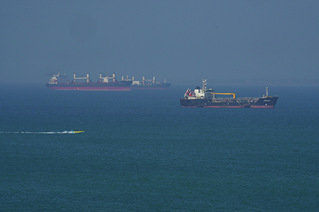 An oil tanker navigates the Strait of Hormuz April 28 as Iran and the United States trade proposals to end their blockade of the strategic waterway and resolve tensions over Iran's nuclear program. (Photo by Asghar Besharati/Getty Images)