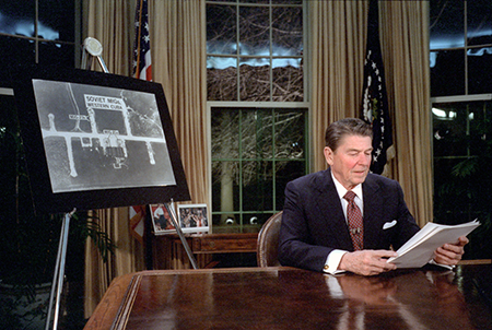 U.S. President Ronald Reagan prepares to address the nation from the Oval Office in 1983 on his Strategic Defense Initiative, commonly called “Star Wars.”  (Photo by: Universal History Archive/Universal Images Group via Getty Images)