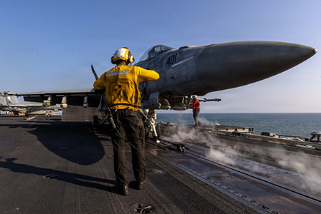 An F/A-18E Super Hornet prepares to launch March 6 from the flight deck of Nimitz-class aircraft carrier USS Abraham Lincoln in support of the U.S.-Israeli war against Iran. The war has complicated U.S.- Saudi efforts to complete a nuclear cooperation agreement. (U.S. Navy photo)