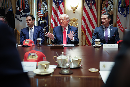 U.S. President Donald Trump (C) speaks during a Cabinet meeting at the White House May 27, days after saying a peace deal with Iran was “largely negotiated.” (Photo by Win McNamee/Getty Images)