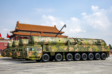 DongFeng-31 land-based intercontinental ballistic missiles pass through Tiananmen Square as part of the September 3 Victory Day military parade, when the land-, sea-, and air-based strategic forces were displayed as the nuclear triad for the first time. (Photo by VCG/VCG via Getty Images)