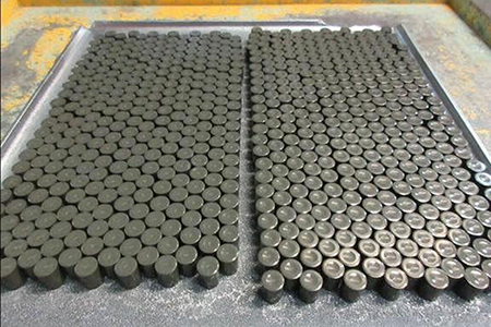 Working out safeguards is one challenge created by the expansion of microreactors, expert Zohaib Altaf writes. Many advanced reactors depend on high-assay, low-enriched uranium (HALEU) for fuel and wider use would mean larger inventories of this nuclear fuel transiting the world. Russia used to be the prime supplier but Westinghouse Electric Co. last year produced its first HALEU fuel pellets, shown above.  (Photo from Westinghouse Electric Co.)