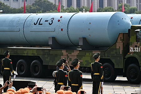 The JL-3 intercontinental-range submarine-launched ballistic missile, shown during a 2025 military parade in Beijing, is part of China's accelerated nuclear modernization program that is heightening international concerns over the collapse of arms control. (Photo by Pedro Pardo/AFP via Getty Images)
