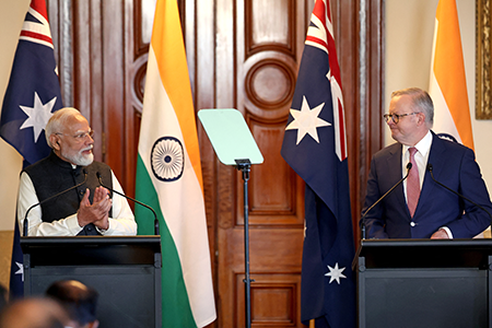 Indian Prime Minister Narendra Modi (L) and Australian Prime Minister Anthony Albanese during a press conference at Government House Victoria in Melbourne July 9. They announced a nuclear agreement under which Australia will export uranium to India. (Photo by Martin Keep / AFP via Getty Images)