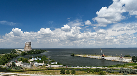 Two cooling towers dominate the landscape in a 2019 file photo of the Zaporizhzhia Nuclear Power Plant in southeastern Ukraine. Attacks and disruptions at the complex are intensifying due to Russia’s war against Ukraine. (Photo by Dmytro Smolyenko/Future Publishing via Getty Images)