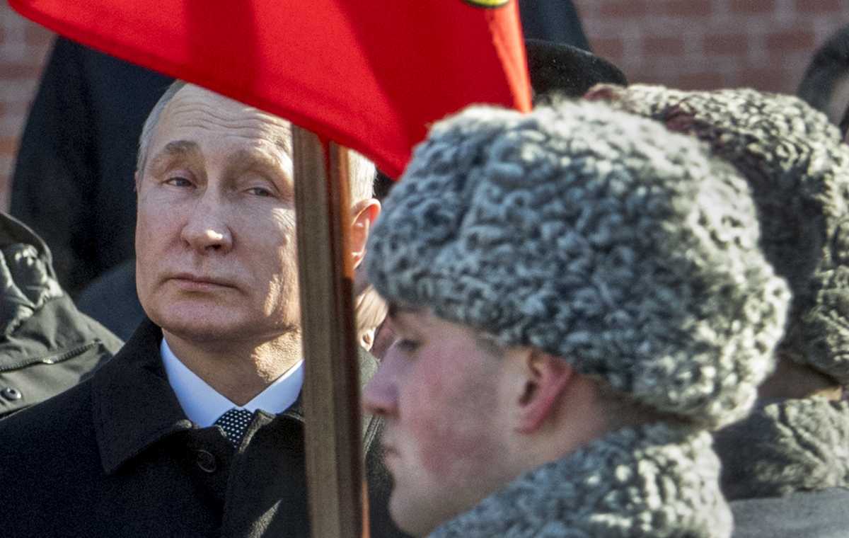 Russian President Vladimir Putin attends a wreath laying ceremony at the Tomb of the Unknown Soldier near the Kremlin wall to mark Defender of the Fatherland Day in Moscow on February 23, 2018. Defender of the Fatherland Day, celebrated in Russia on February 23, honours the nation's army and is a nationwide holiday. (Photo: YURI KADOBNOV/AFP/Getty Images)