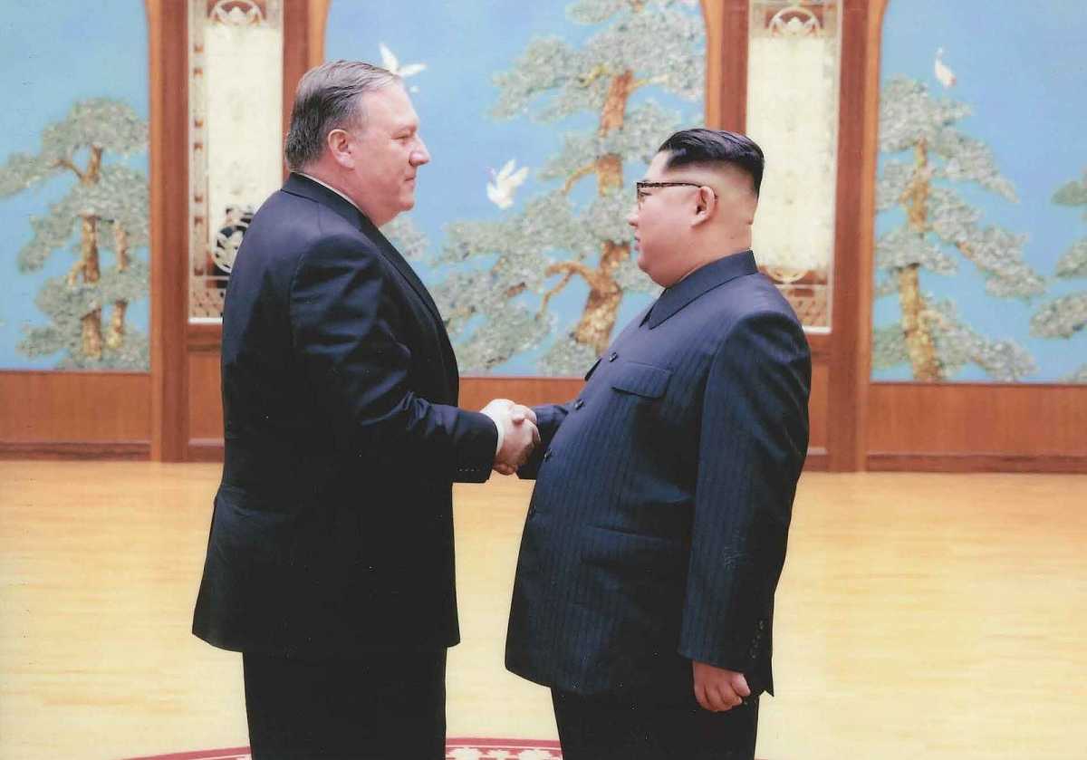 North Korean leader Kim Jong Un is shown shaking hands with then-CIA Director Mike Pompeo in Pyongyang. (Photo: The White House via Getty Images)