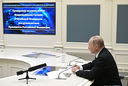 President Vladimir Putin oversees the training of troops responsible for responding to threats of nuclear war, via a video link in Moscow October 26, 2022. (Photo via Getty Images)