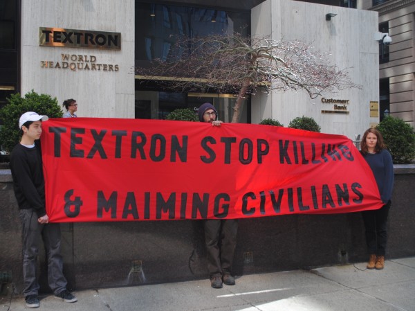 Peace activists demonstrated in front of Textron’s world headquarters in April for its role in supplying cluster bombs to Saudi Arabia. (Photo: RiFuture.org/@SteveAhlquist)