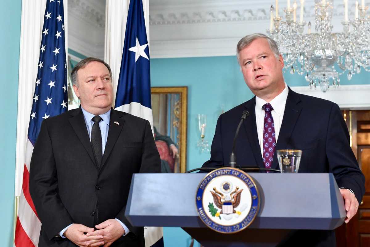 Special Representative for North Korea Steven Biegun flanked by U.S. Secretary of State Michael R. Pompeo addresses the press at the U.S. Department of State in Washington, D.C. on August 23, 2018. [State Department photo/ Public Domain]