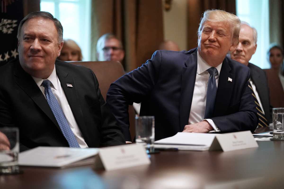 President Donald Trump listens to a presentation about prescription drugs during a cabinet meeting with Secretary of State Mike Pompeo (L), acting Defense Secretary Richard Spencer and others at the White House July 16, 2019. (Photo by Chip Somodevilla/Getty Images)