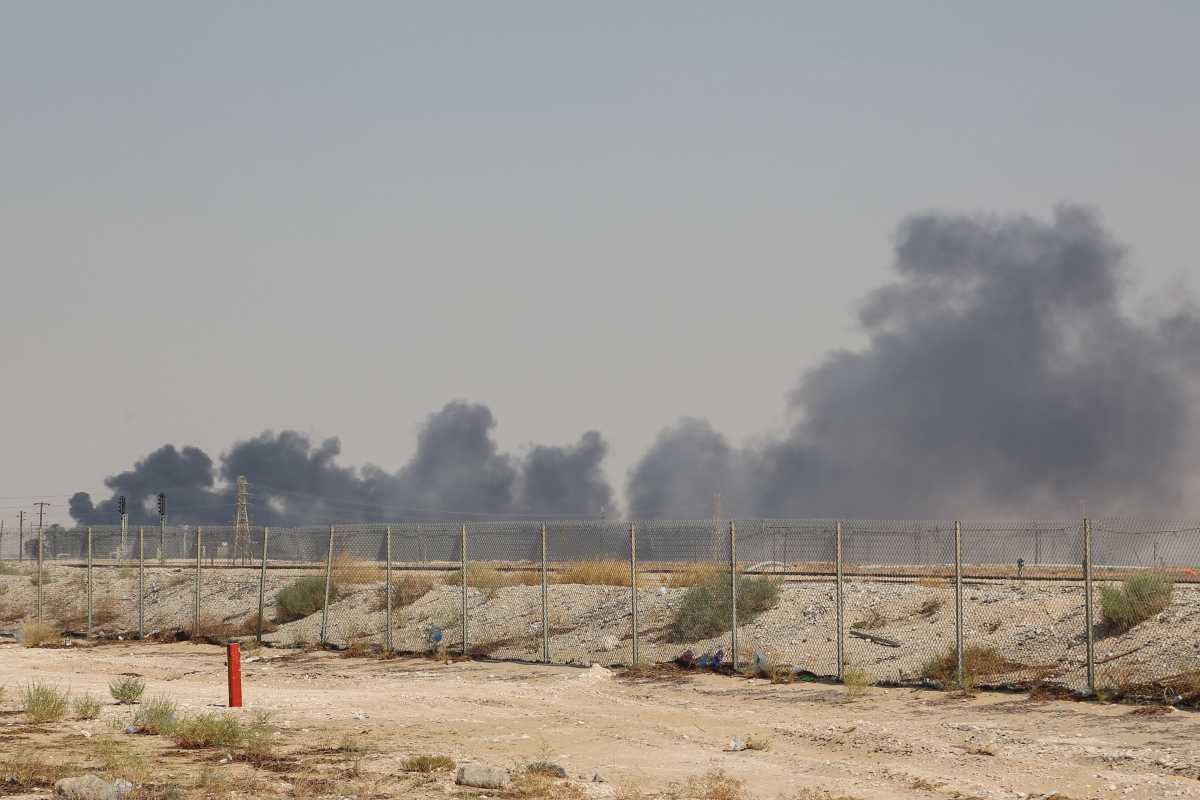 Smoke billows from an Aramco oil facility in Abqaiq about 60km (37 miles) southwest of Dhahran in Saudi Arabia's eastern province on September 14, 2019. (Photo by AFP/Getty Images)