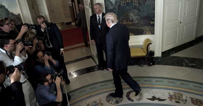 US President Donald Trump leaves after delivering a speech on the Iran deal from the Diplomatic Reception room of the White House in Washington, DC, on October 13, 2017. President Donald Trump on October 13 refused to certify the 2015 Iranian nuclear deal, and warned the United States may yet walk away from 'one of the worst' agreements in history. (Photo:BRENDAN SMIALOWSKI/AFP/Getty Images)