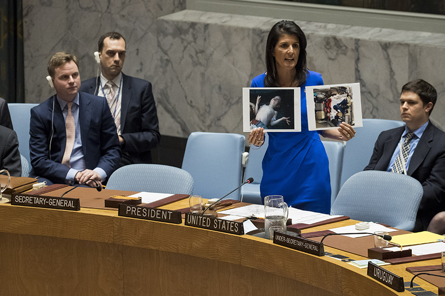 During an emergency Security Council session on April 5, 2017, then-U.S. Ambassador to the United Nations Nikki Haley displayed photos of the victims of the Syrian government’s April 4 chemical weapons attack in Khan Shaykuhn. Sarin, a nerve agent, was used in the attack which reportedly killed as many as 100 people. (Photo: Drew Angerer/Getty Images)