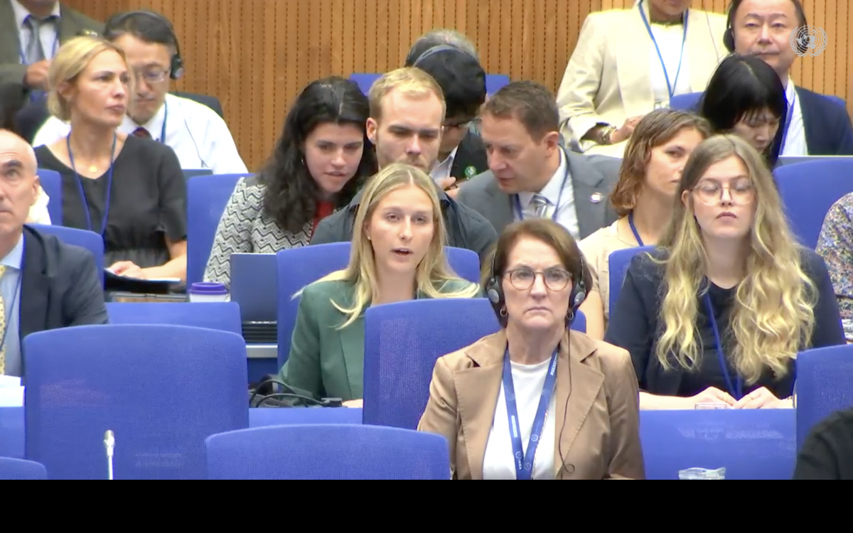 Patricia Jaworek (center) with the Young Deep Cuts Commission delivers the NGO Statement on behalf of its signers. (Photo: UN WebTV)