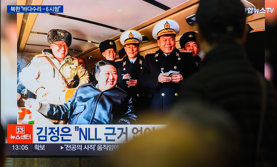 North Korean leader Kim Jong Un (C) is rapidly advancing his missile and other military capabilities and putting them on full display. On February 14, he inspected the test-firing of a new surface-to-sea missile, according to North Korean state media and video shown on a television at Seoul’s Yongsan Railway Station. (Photo by Kim Jae-Hwan/SOPA Images/LightRocket via Getty Images)